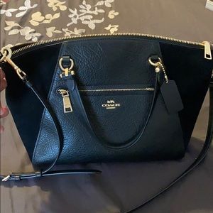 Leather and suede Coach purse.